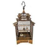 Small oriental dragon themed bird cage measures approx 50cm tall