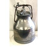 A vintage milking urn