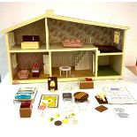 Children's plastic dolls house with furniture