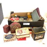 Selection of vintage tins, puzzles and games