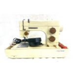 Frister Rossman electric sewing machine 0001281 and a Overlock machine both untested