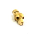 Antique bone dogs head whistle, approximate length 4cm