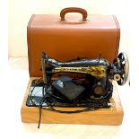 Cased Singer sewing machine, converted to electric, untested
