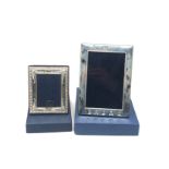 2 boxed silver picture frames largest measures approx 18.5cm by 13.5cm