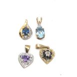4 x 9ct gold gemstone & diamond set pendants inc. sapphire, topaz & amethyst (2.6g)