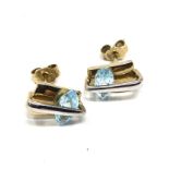 9ct yellow & white gold blue topaz stud earrings (2g)