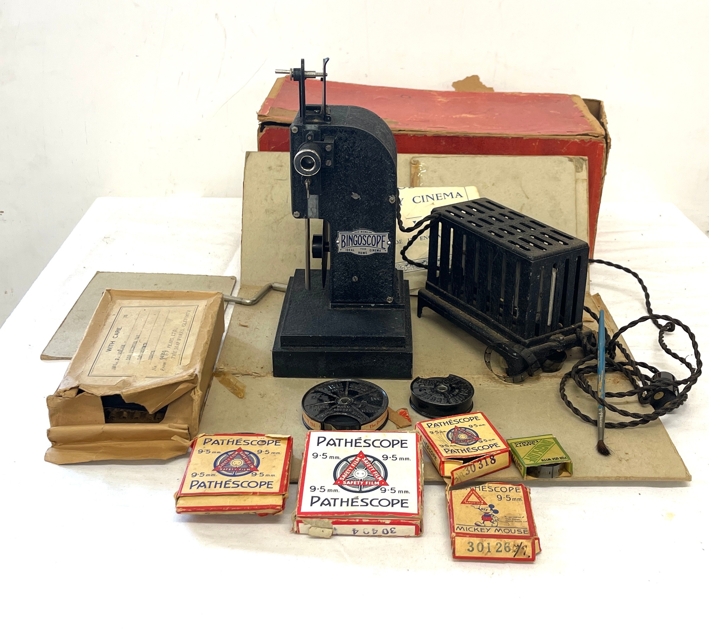 Bingoscope 9.5mm film projector and transformer, with 5 Films, untested