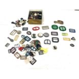 Selection of vintage belt buckles and vintage buttons