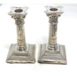 Pair of silver candlesticks measure height approx 16cm birmingham silver hallmarks filled bases
