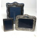 3 silver picture frames largest measures approx 21cm by 15cm