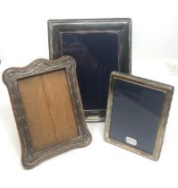 3 silver picture frames largest measure approx 22cm by 18cm