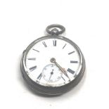 antique open face pocket watch the watch is ticking