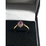 9ct gold ruby & diamond halo dress ring (2g)