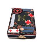 Collection of british red cross medals badges in covered box all relating to miss nelly street