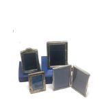 4 small silver picture frames