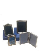 4 small silver picture frames