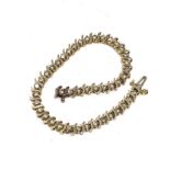 10ct gold diamond tennis bracelet set with 44 champagne diamonds weight of bracelet 9.2g est 1ct