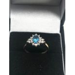 9ct gold diamond framed topaz ring (2.6g)