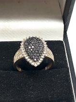 Fine 9ct gold diamond ring set with central black diamonds with diamond halo & diamond shoulders