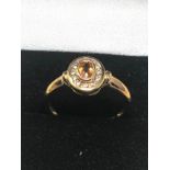 9ct Gold Diamond Framed Sapphire Ring (2.3g)