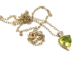 9ct gold peridot & diamond pendant & chain large central peridot measures approx 9mm by 8mm with