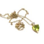 9ct gold peridot & diamond pendant & chain large central peridot measures approx 9mm by 8mm with