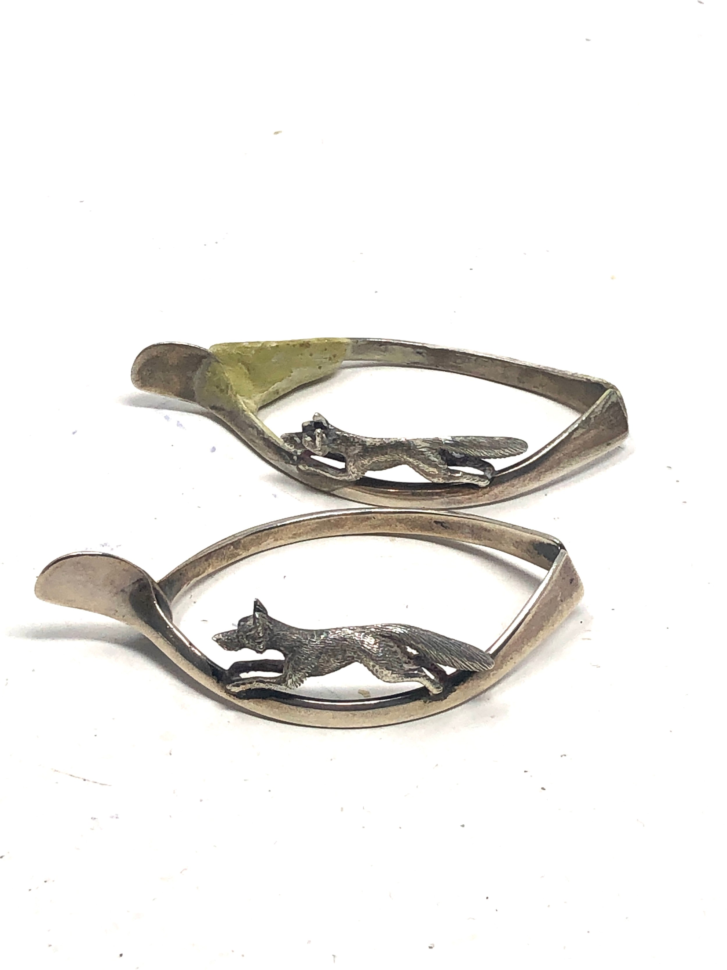 2 silver fox mounted serviette rings 1 in need of restoration