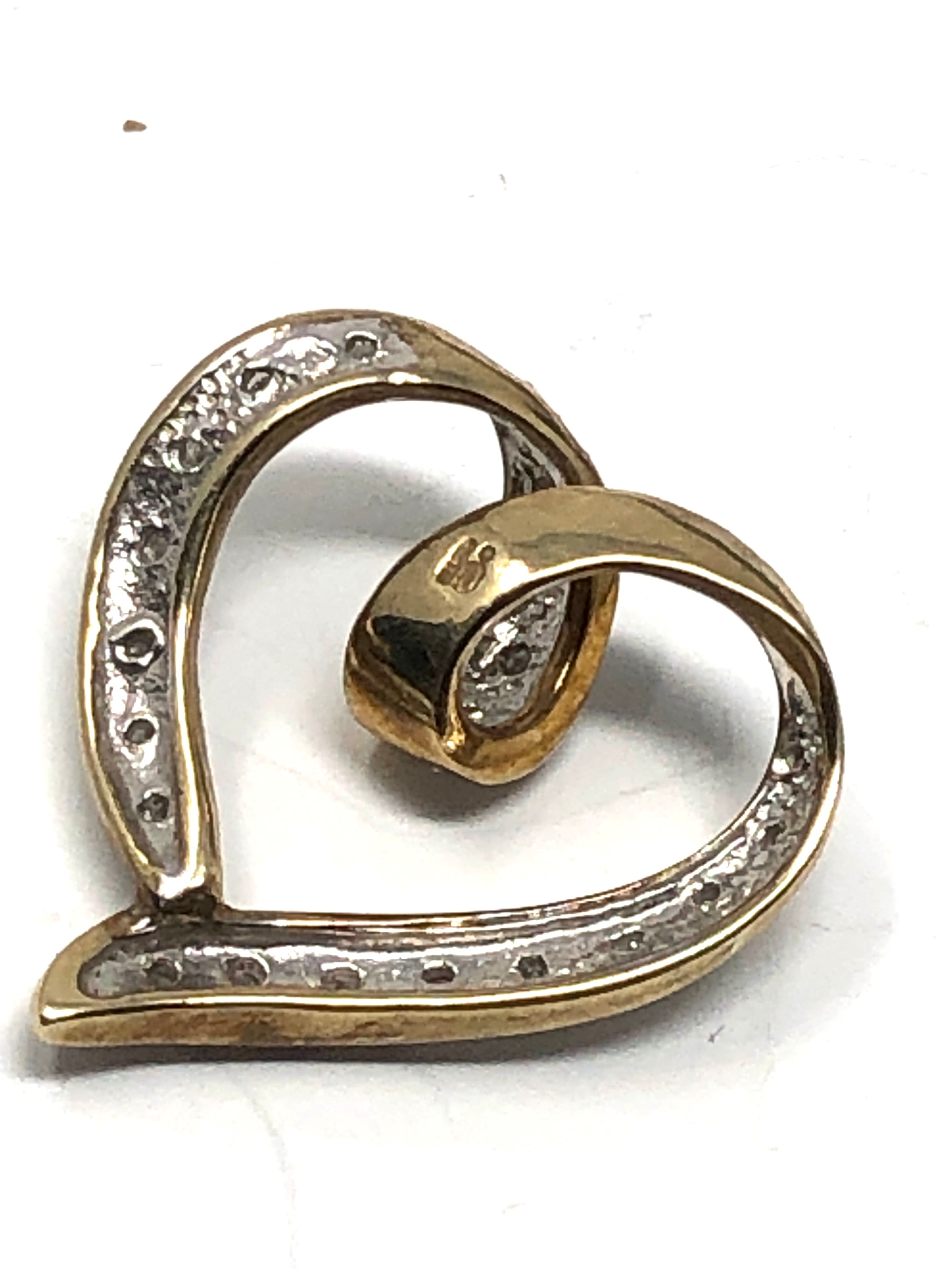 9ct gold diamond set heart pendant measures approx 2cm drop by 1.8cm wide weight 2.1g - Bild 4 aus 4