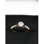 Fine 18ct gold diamond ring set with central diamond measures approx 4.5mm with diamond shoulders