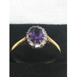 18ct Gold Diamond Framed Amethyst Halo Ring (2.7g)