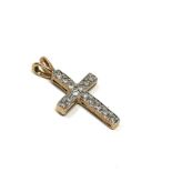 9ct gold diamond set cross pendant measures approx 2.2cm drop by 1.1cm wide