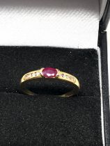 Fine 18ct gold ruby & diamond ring centaralruby measures approx 4mm by 3mm with diamond shoulders