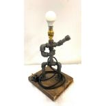 Novelty pipe lamp made from radiator fittings. Measures approx 18.5 height