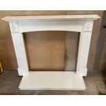 Wooden fire surround with marble hearth, approximate inner measurements of surround Width 34.5