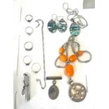 Selection of silver jewellery includes 5 silver rings, Abalone set jewellery, silver Junior Gas