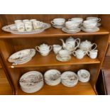 Oriental Lithophane Ware to include 6 coffee cups, milk jug, sugar pot, five tea cups 1 repaired,