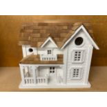 Decorative house design bird house, approximate measurements: Height 27cm, Width 30cm, depth 20cm