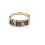 9ct Gold diamond and red stone ring UK size O total approxiamte weight 3 grams