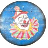 Wooden circular clown painted barrel top, approximate diameter: 20.5 inches