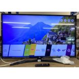 LG 43 inch TV on stand, working order