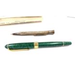 Vintage Eversharp silver pencil with paperwork and a Pierce Fanles fountain pen