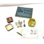 Selection of comemorative ware includes first day covers, spoons, stamps etc