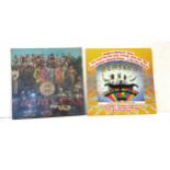 Two Beatles vinyl records to include Magical Mystery Tour and Lonely hearts