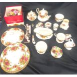 22 pieces of Royal Albert Country Rose to include tea pot, gravy boat, plates etc Some pieces have