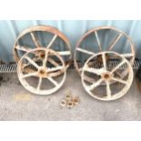 Four antique metal wheels measures approx diameter 20 inches