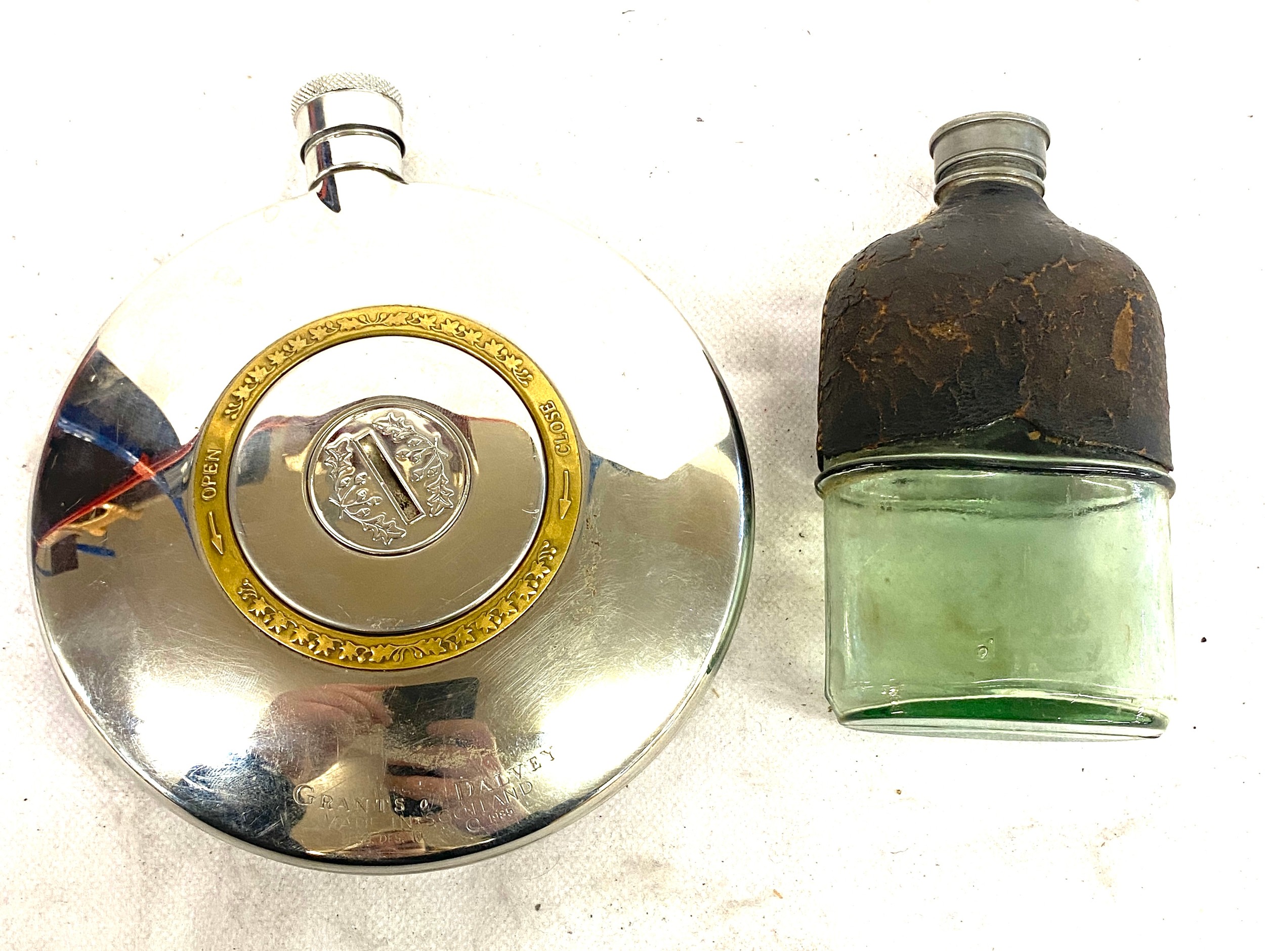 Two vintage hip flasks include The dalvey flask etc
