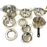 Selection of metal kitchenware to include bowls, large saucepan etc
