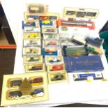 Large selection of boxed die cast cars includes Days Gone, corgi, Hornby etc