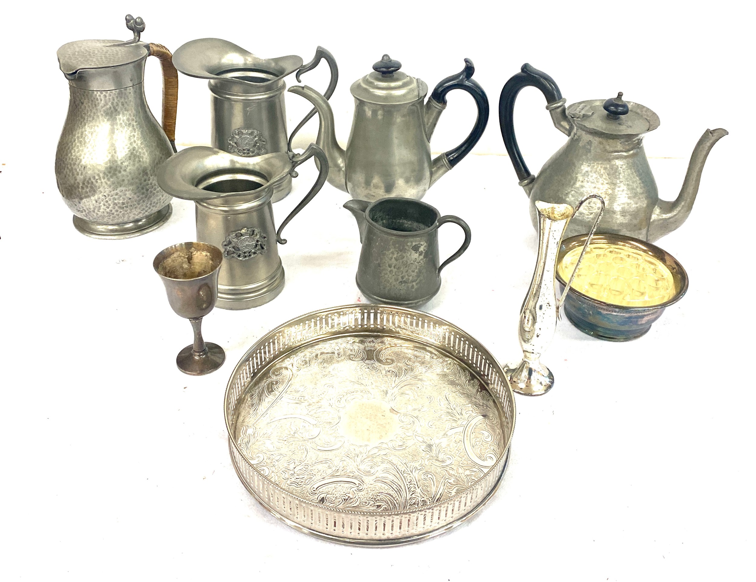 Large selection of pewter/ metal ware includes jugs, rose vase etc