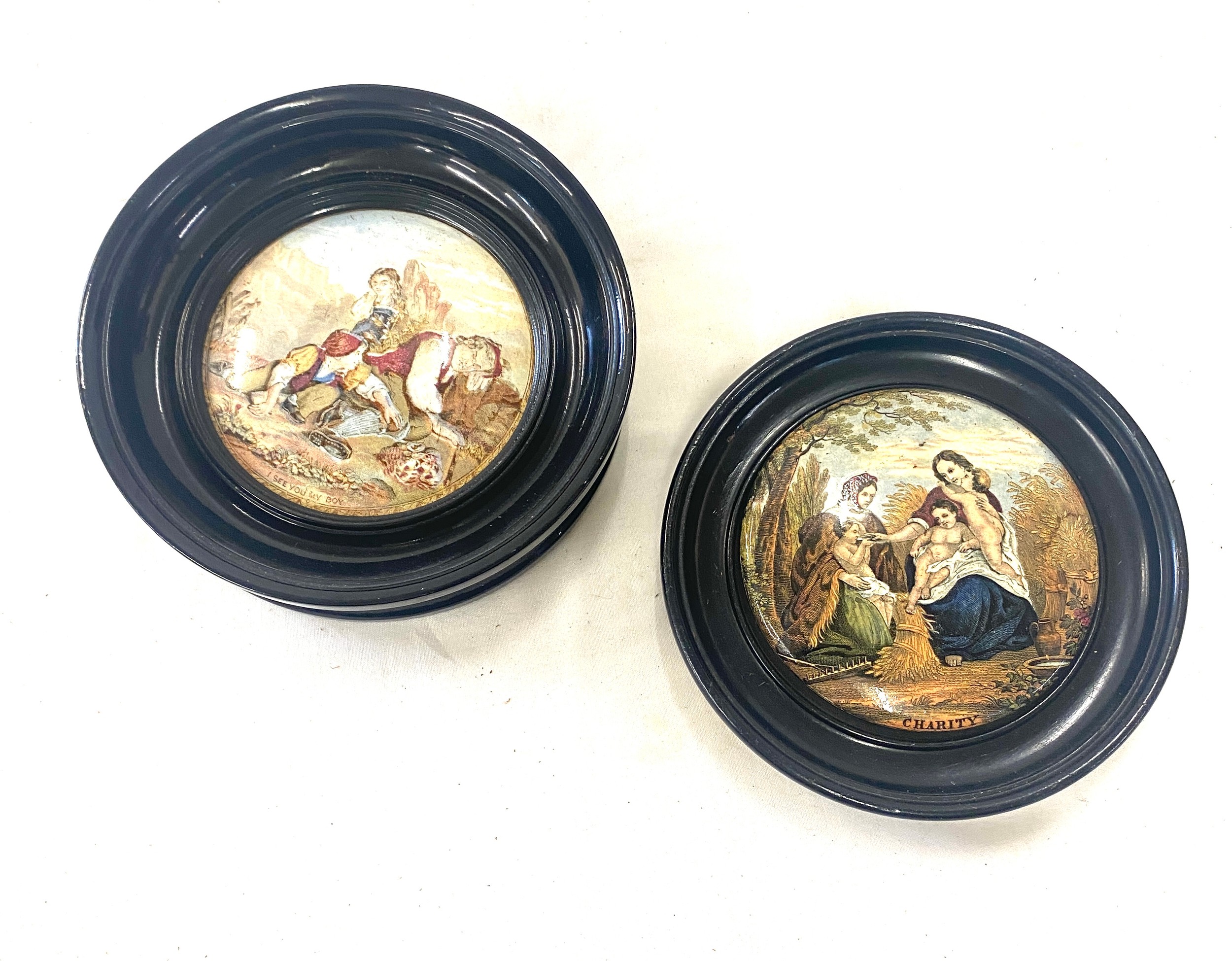 Two vintage framed pot lids includes i see you my boy and charity, largest measures approx 6.5